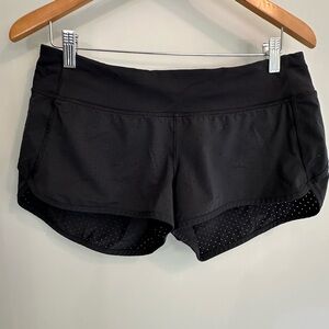 Lululemon Speed shorts. Size 8. 2.5. Black lined perforated. Super cute!